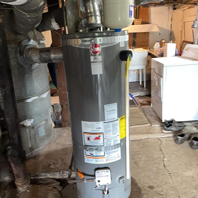 Water heater with expansion tank and seismic strapping Water heater with expansion tank and seismic strapping
