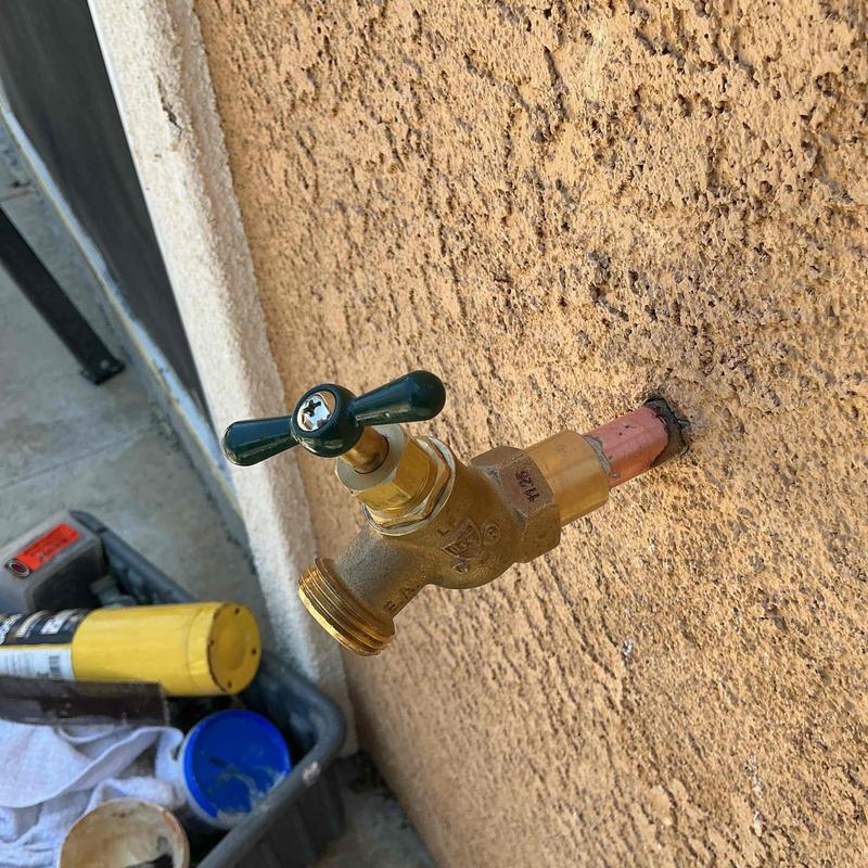 Hose bib installation on exterior stucco wall