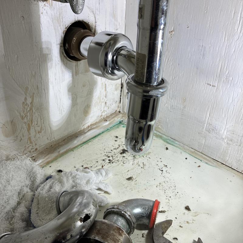 Bathroom sink P-trap replacement under counter