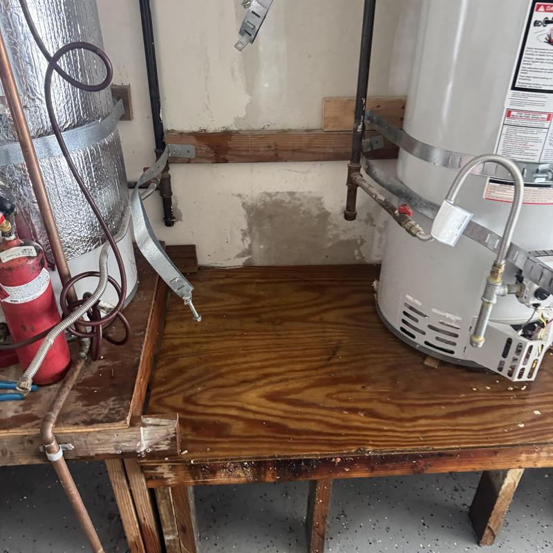 50-gallon water heater installation with piping connections