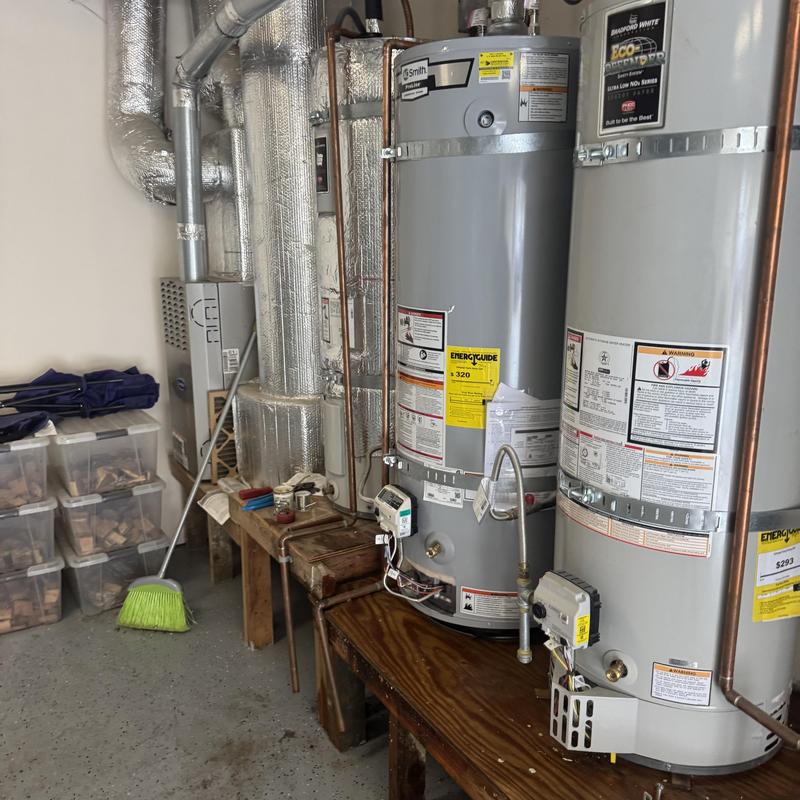50-gallon water heater installed with new piping