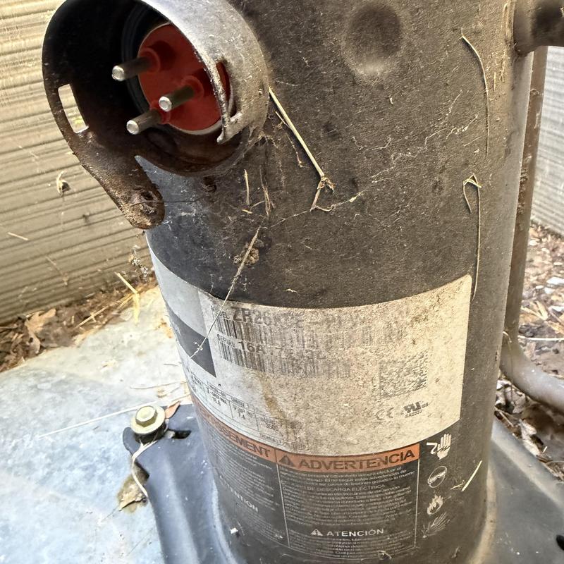 AC compressor unit with wiring connection and dirt buildup AC compressor unit with wiring connection and dirt buildup