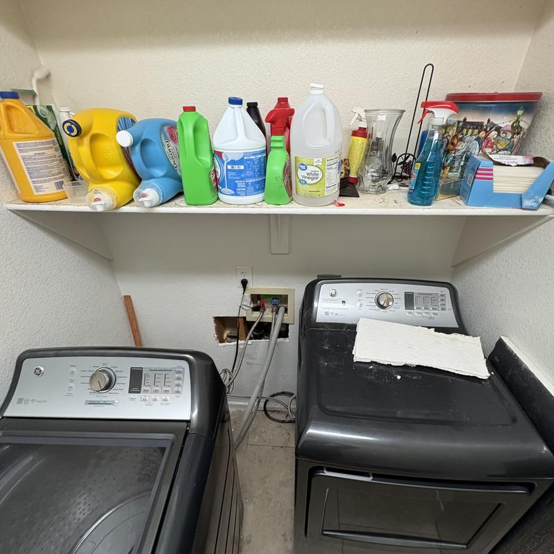 Washer valves with detergent and cleaning supplies shelf