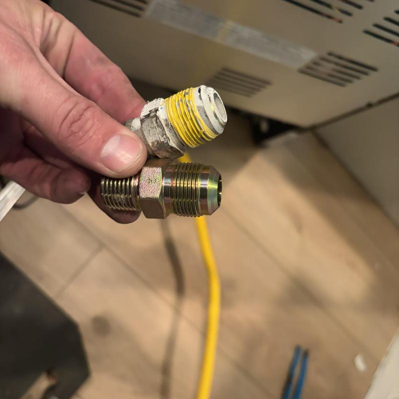 Gas stove flare fitting adapter replacement with thread tape