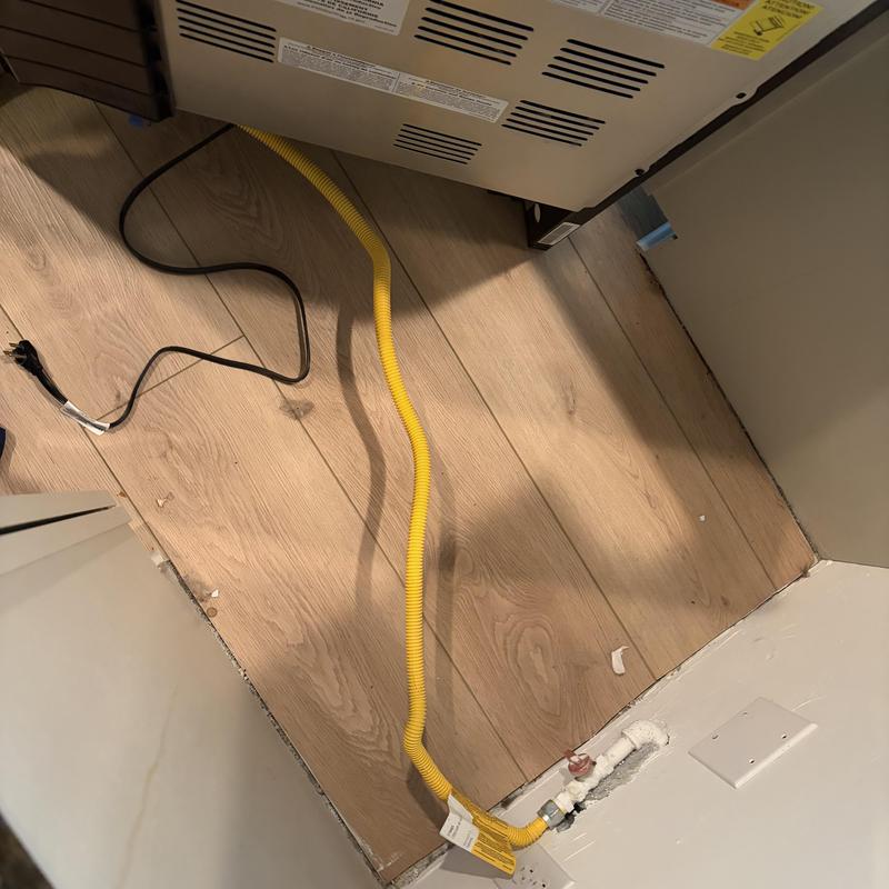 Flexible gas connector with new flare fitting installed