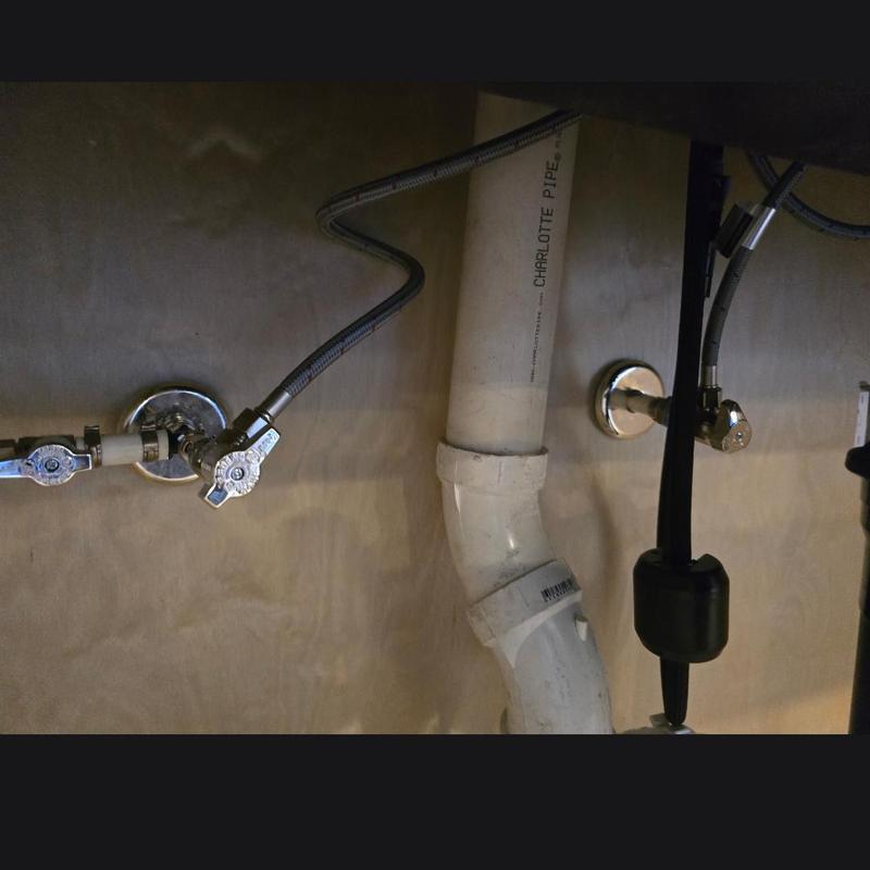 Dishwasher and faucet water supply lines under sink