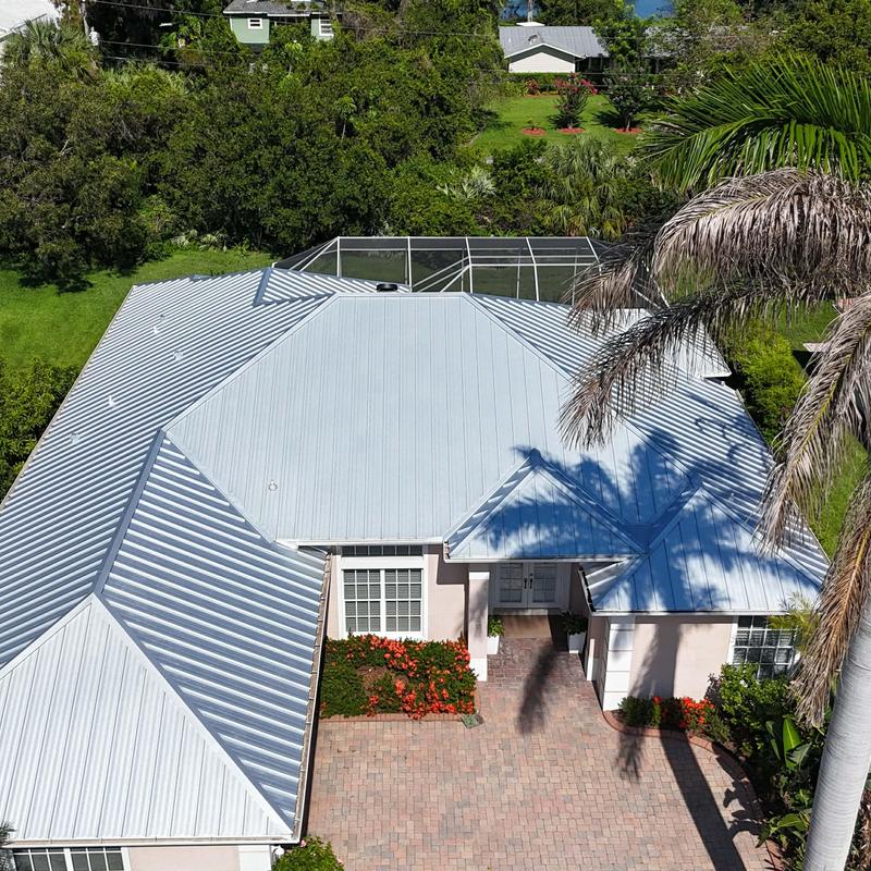 Standing seam metal roof installation on residential home Standing seam metal roof installation on residential home