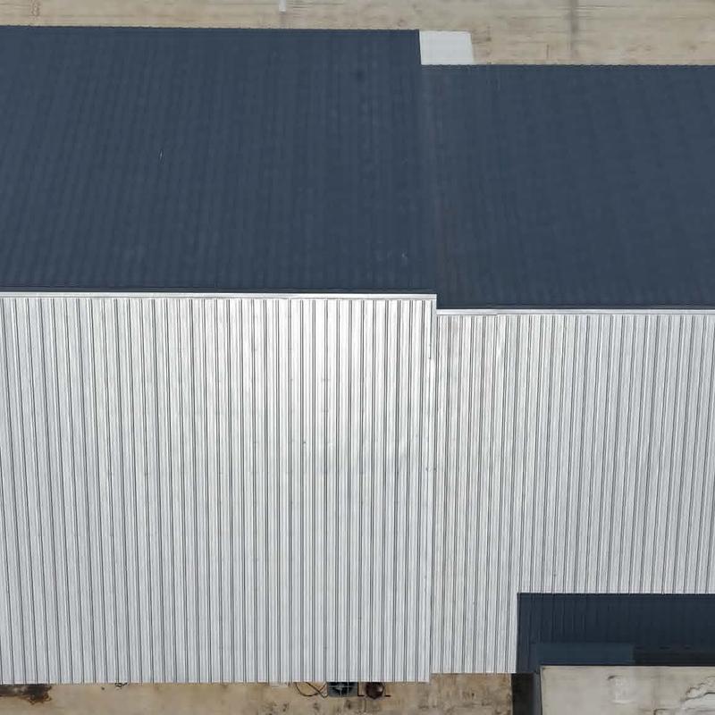 PBR metal roofing panels on commercial building roof PBR metal roofing panels on commercial building roof