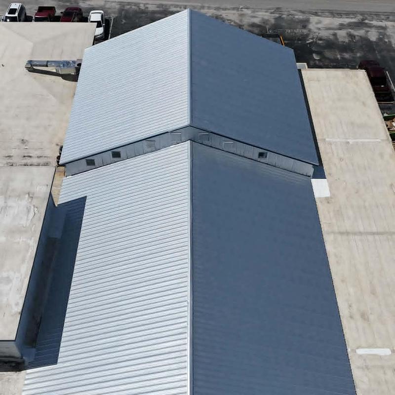 PBR metal roofing panels on commercial building roof PBR metal roofing panels on commercial building roof