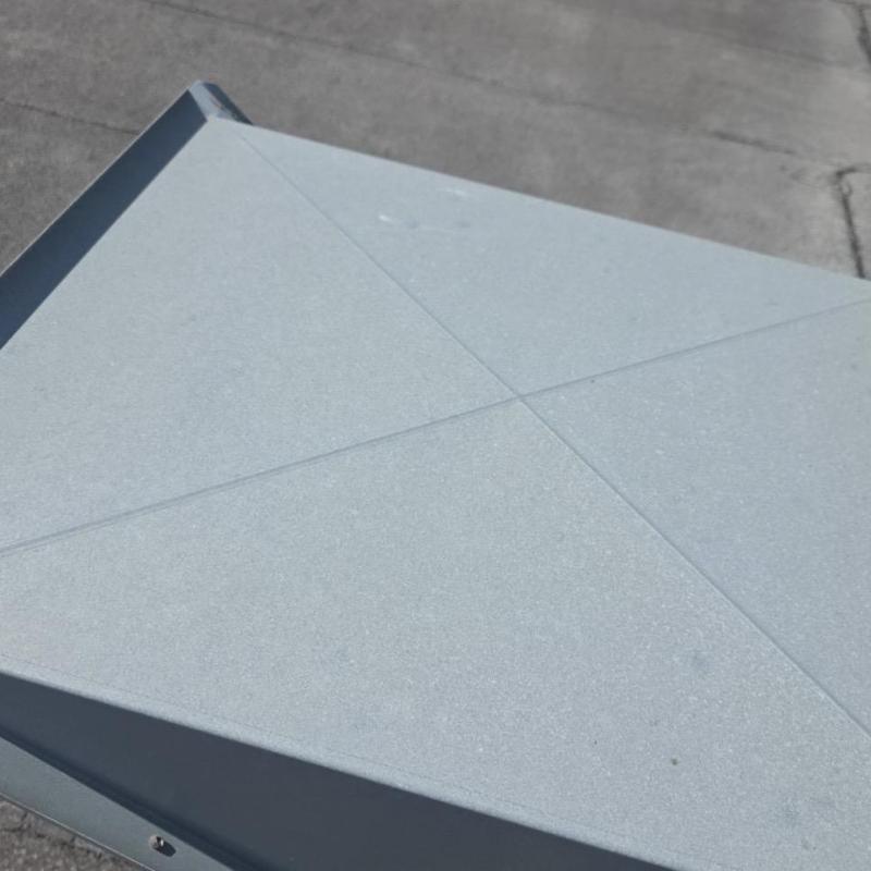 Rooftop metal component with minor damage