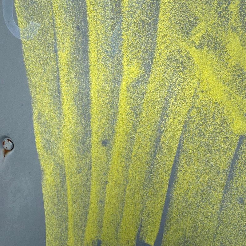 Flashing system hail damage marked with yellow powder