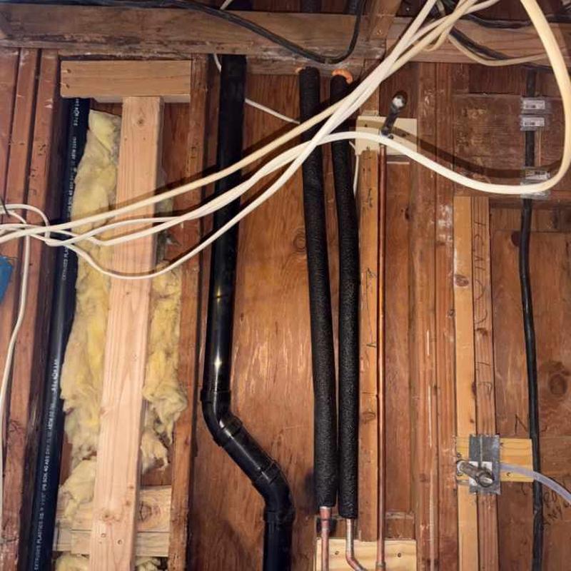 2-inch ABS drain pipe with new insulation installed
