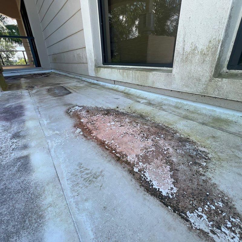 Flat deck roofing with surface deterioration near window wall Flat deck roofing with surface deterioration near window wall