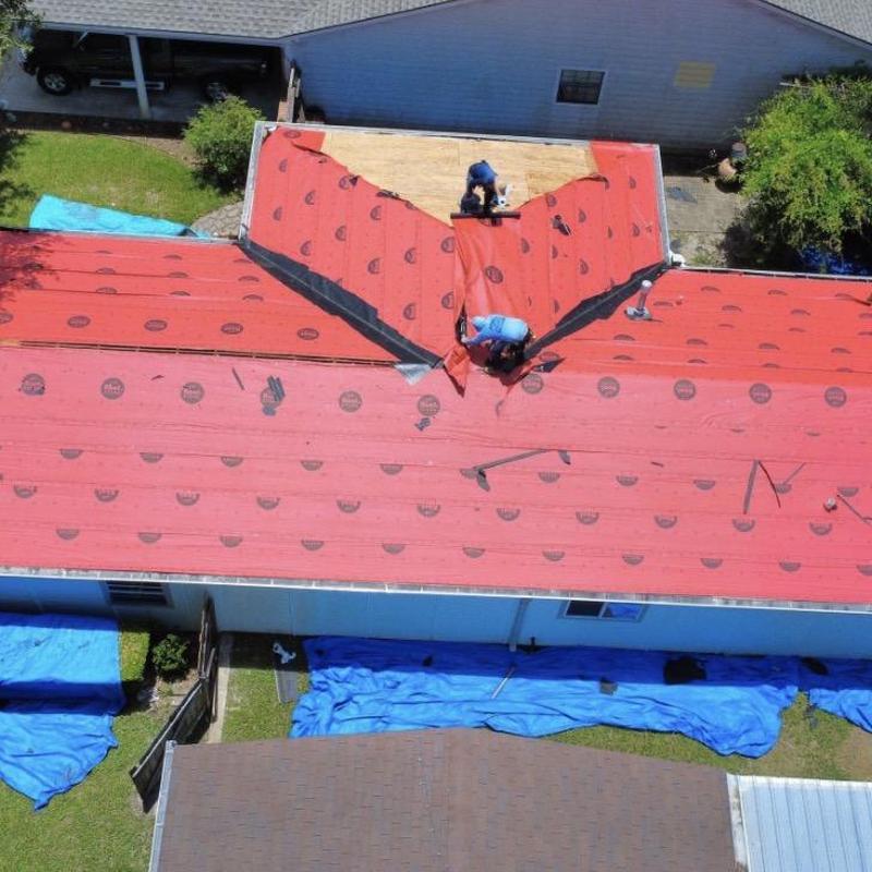 Roofing underlayment installation on residential roof