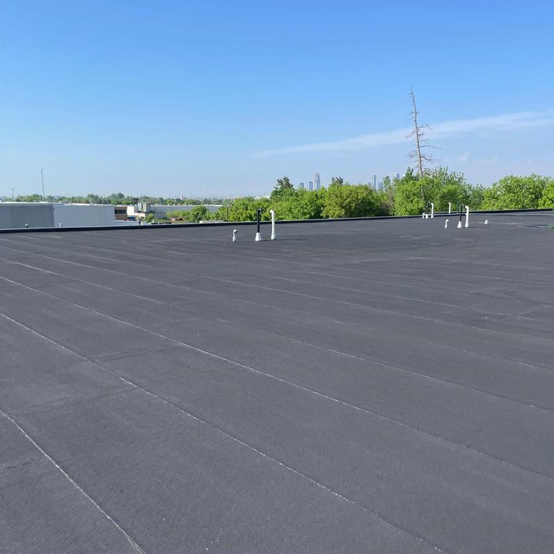 Flat roofing membrane with vent pipes in Irvine, CA Flat roofing membrane with vent pipes in Irvine, CA