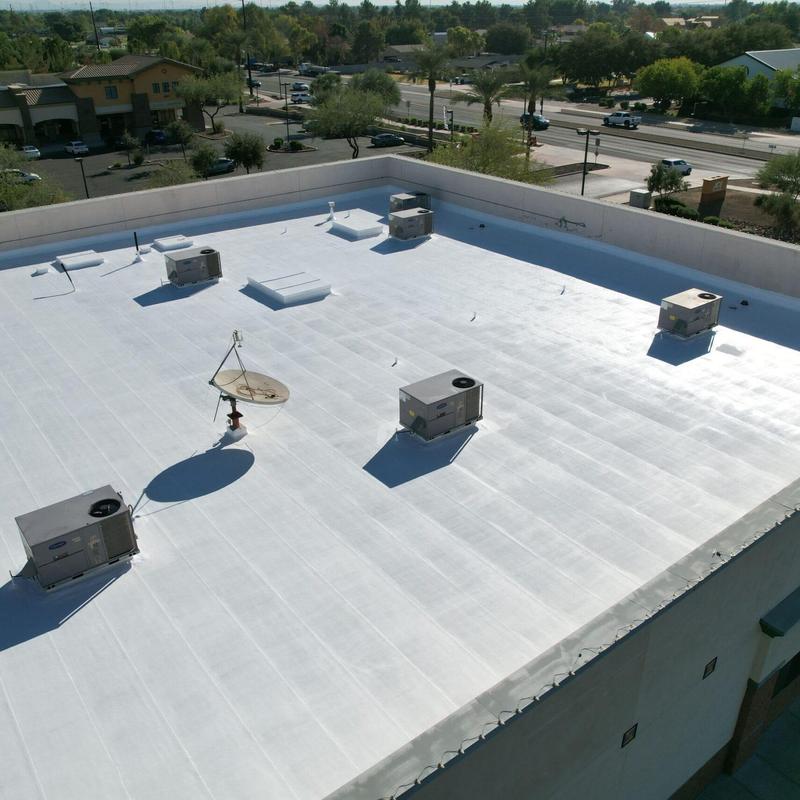 Commercial flat roof with HVAC units and satellite dish Commercial flat roof with HVAC units and satellite dish