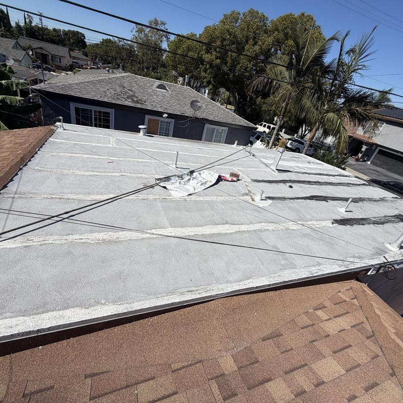 Flat torch down roof with sealing lines and vents Flat torch down roof with sealing lines and vents