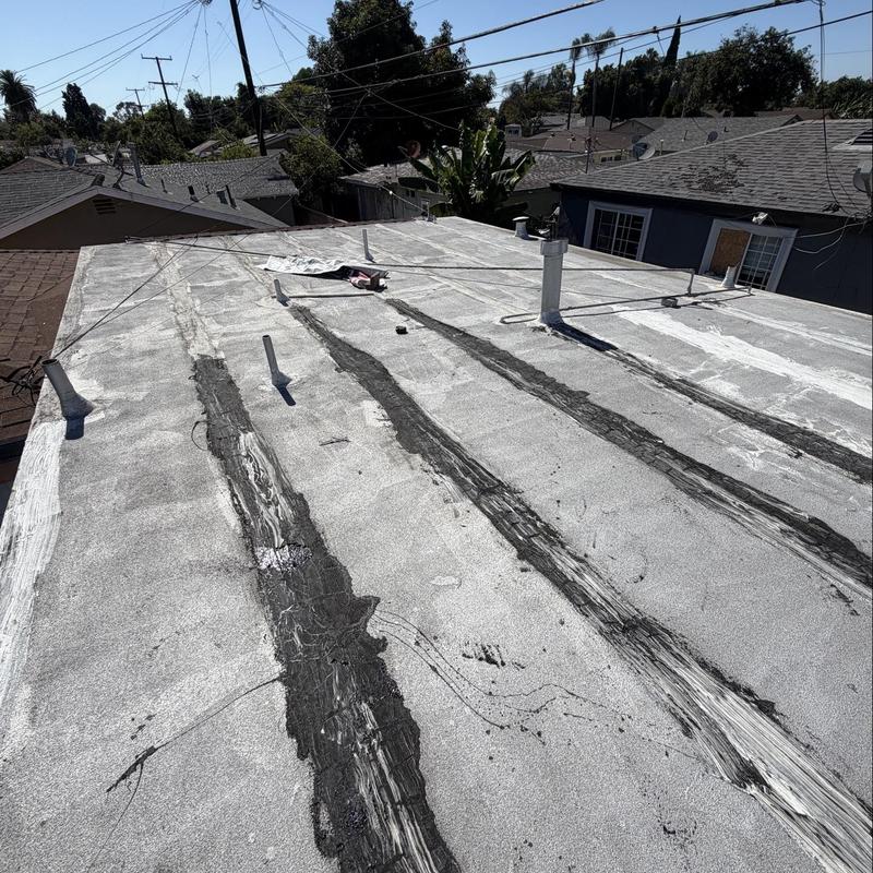 Torch down flat roof with sealed seams inspection Torch down flat roof with sealed seams inspection
