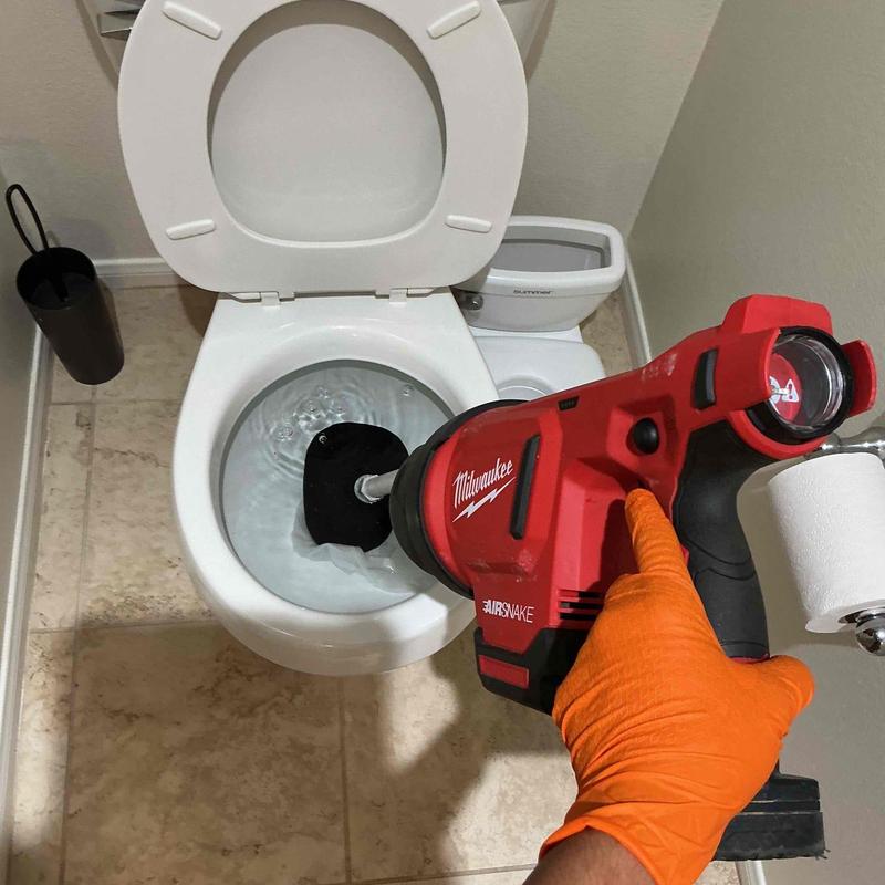 Toilet clog flush with Milwaukee AirSnake tool