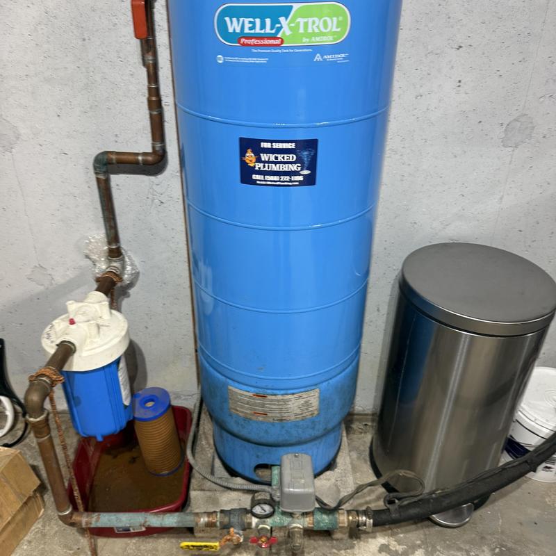 Well pressure tank and filtration system installation Well pressure tank and filtration system installation