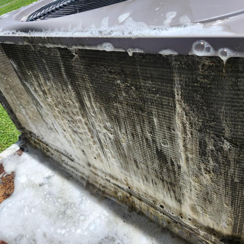 Package system condenser coil covered in cleaning foam Package system condenser coil covered in cleaning foam