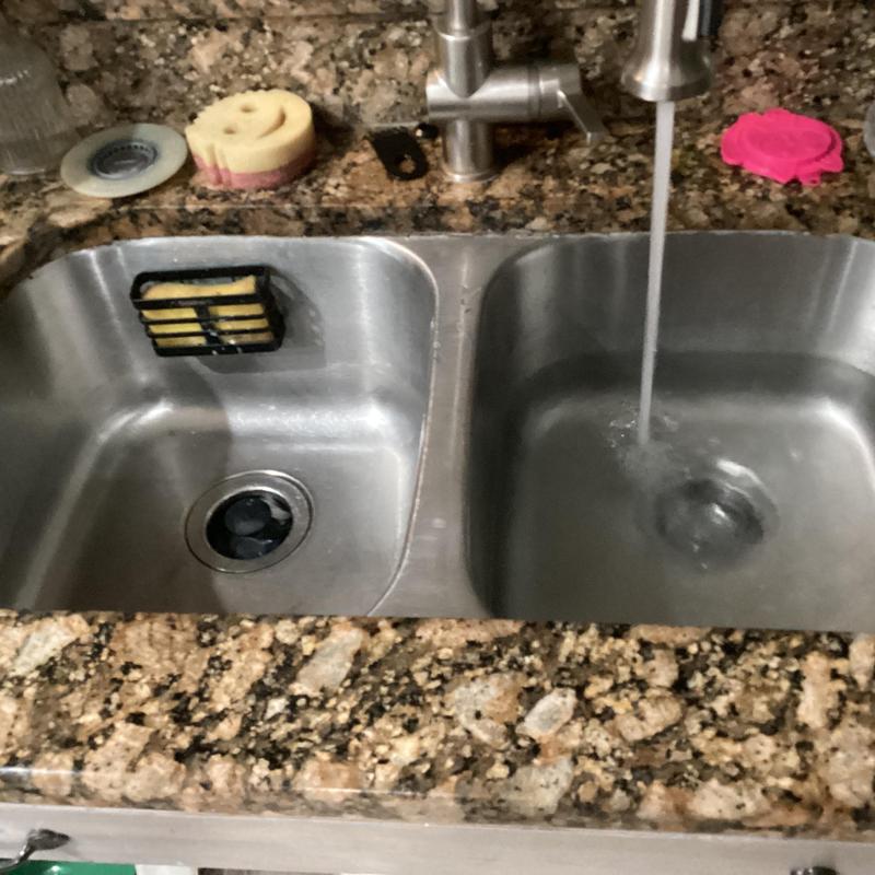 Kitchen sink drain clearing with running water test Kitchen sink drain clearing with running water test