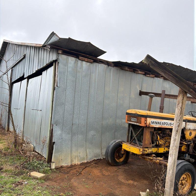 Barn metal roofing with hail damage, Ethridge TN
