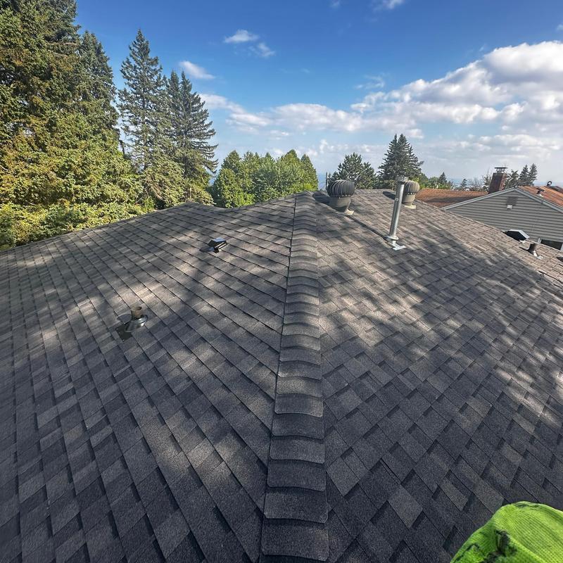 SBS-modified shingle roofing with vent pipes installed