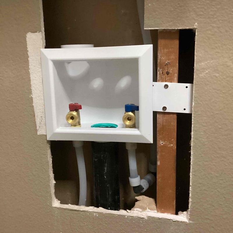 Laundry shut-off valve box with supply lines installed
