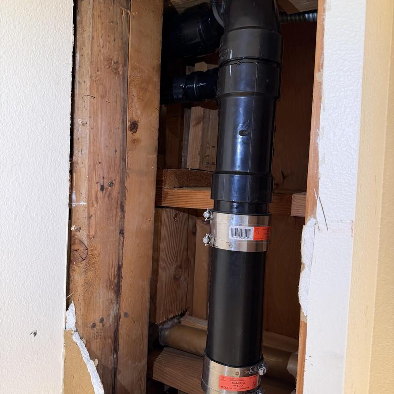 3-inch toilet drain line with repair clamps installed 3-inch toilet drain line with repair clamps installed