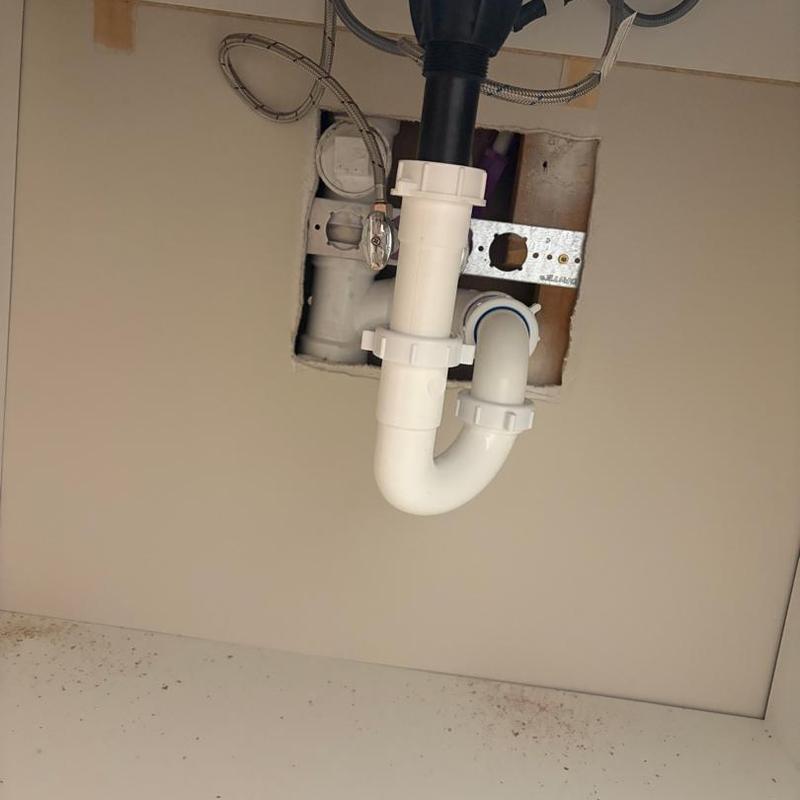Bathroom sink P-trap and drain installation under countertop