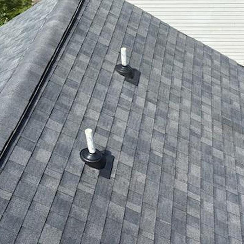 Roof shingles with sealed vent pipe flashing and gutter guards