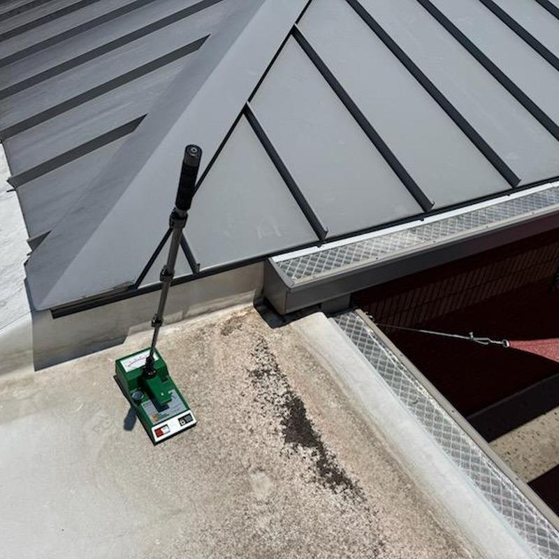 TPO roofing membrane with inspection tool on rooftop TPO roofing membrane with inspection tool on rooftop