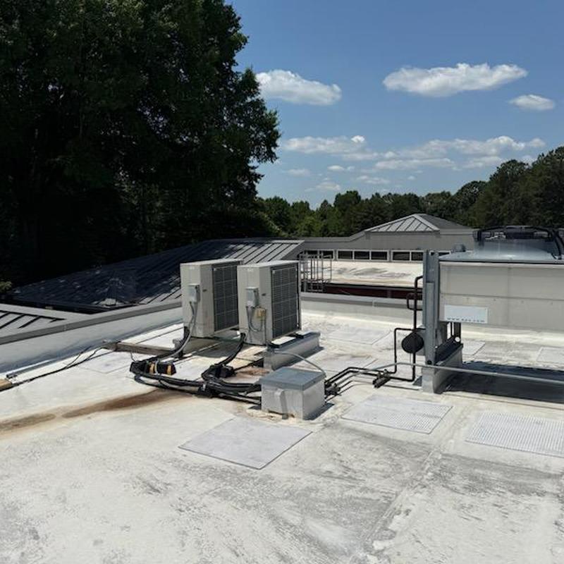 TPO roofing membrane with HVAC units on flat roof TPO roofing membrane with HVAC units on flat roof