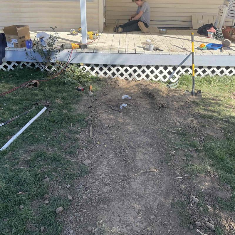 Orangeberg pipe replacement trench near porch and sidewalk Orangeberg pipe replacement trench near porch and sidewalk