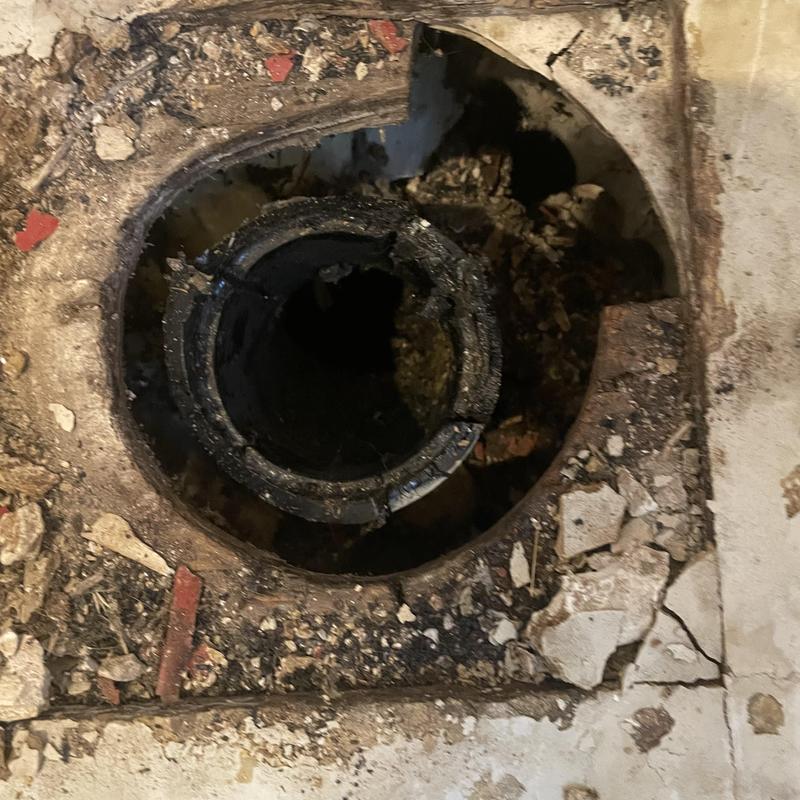 Toilet flange and plumbing drain exposed for replacement Toilet flange and plumbing drain exposed for replacement