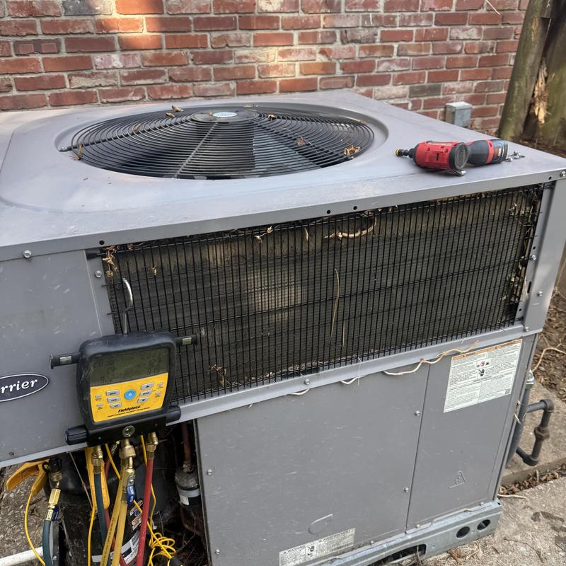 Air conditioner unit with pressure gauge and cordless drill Air conditioner unit with pressure gauge and cordless drill