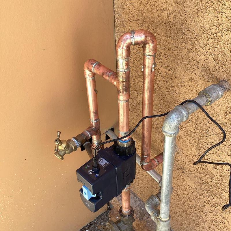 Moen Flo Device installed on copper water pipes