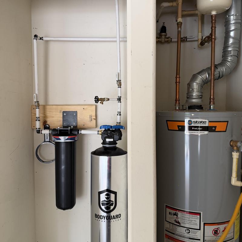 Water filter system installation with water heater nearby Water filter system installation with water heater nearby
