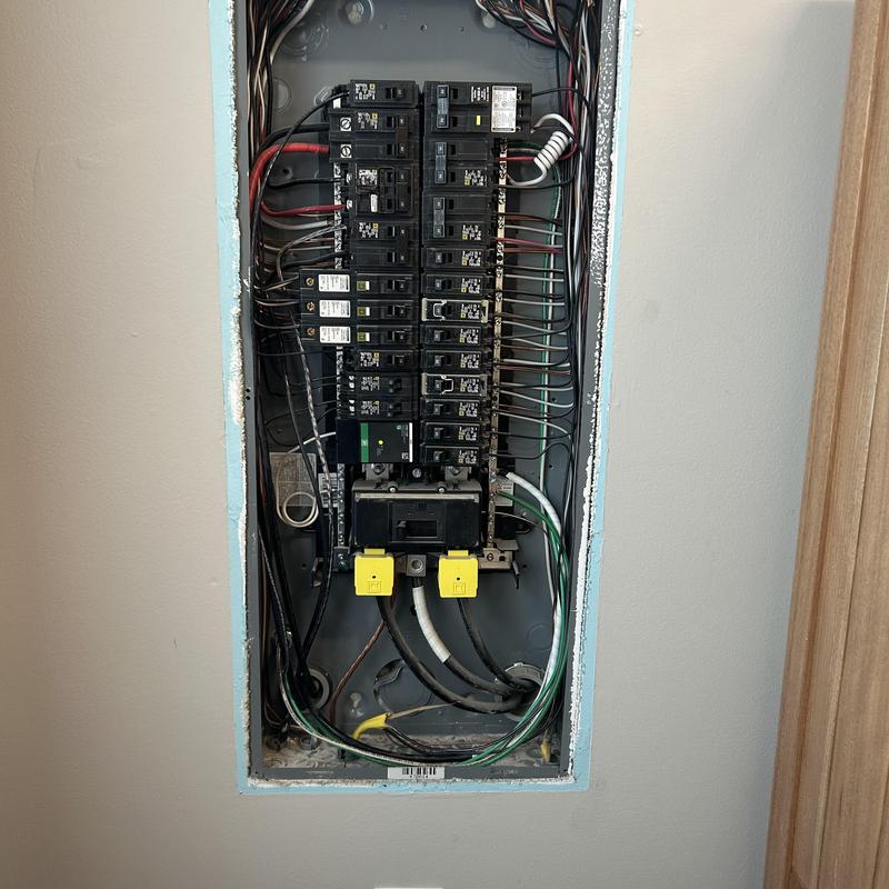 Square D whole home surge protector installed in electrical panel Square D whole home surge protector installed in electrical panel