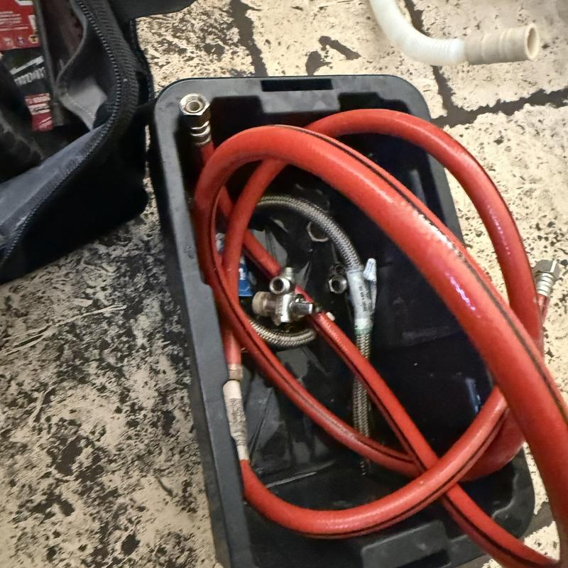 Quarter turn angle stop with red supply hoses