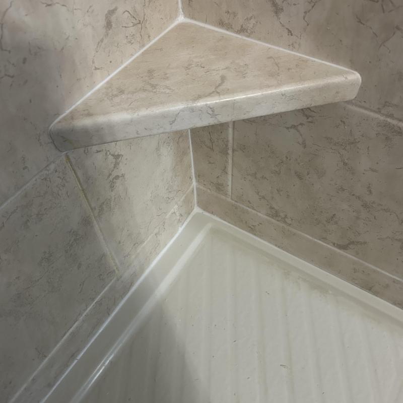 Shower enclosure new mildew-resistant sealant applied Shower enclosure new mildew-resistant sealant applied