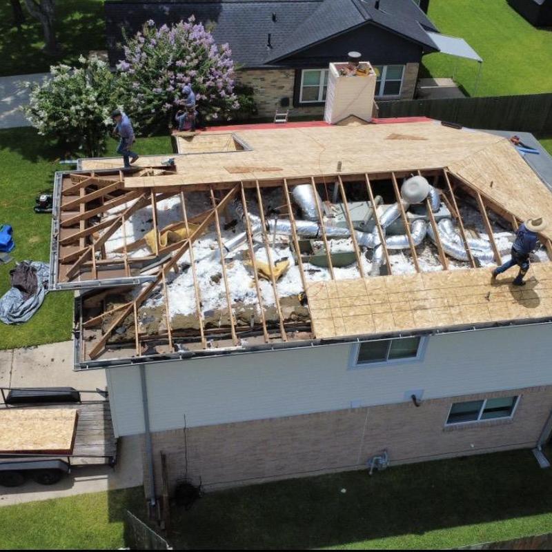 Roof decking installation with plywood on house framing