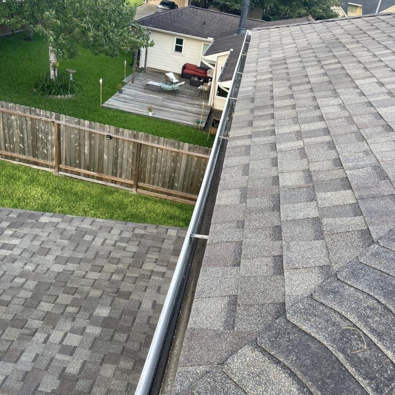 Roof shingles and gutter on residential home