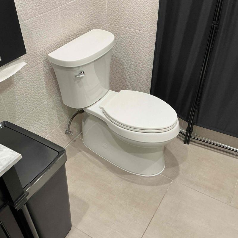 Toilet installation with new mounting system and wax ring