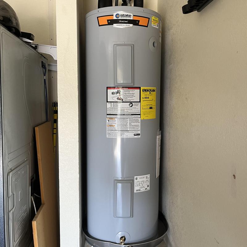 50-gallon electric water heater installed in laundry room 50-gallon electric water heater installed in laundry room