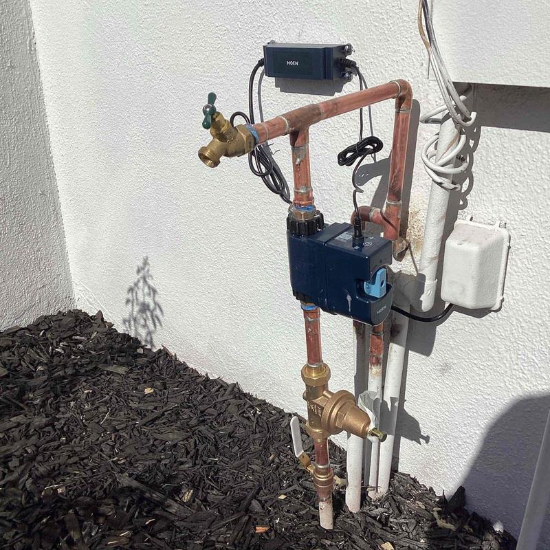 Moen Flo leak-detection device on copper piping