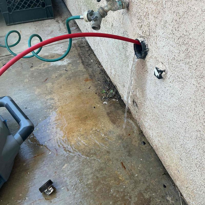 Kitchen drain line flushing with hose from wall outlet