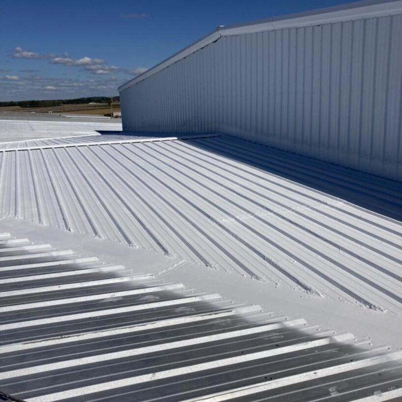 Metal commercial roof with fresh coating application Metal commercial roof with fresh coating application