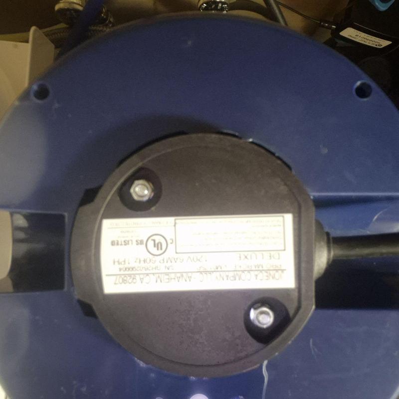 Garbage disposal motor assembly close-up in Glendale, AZ